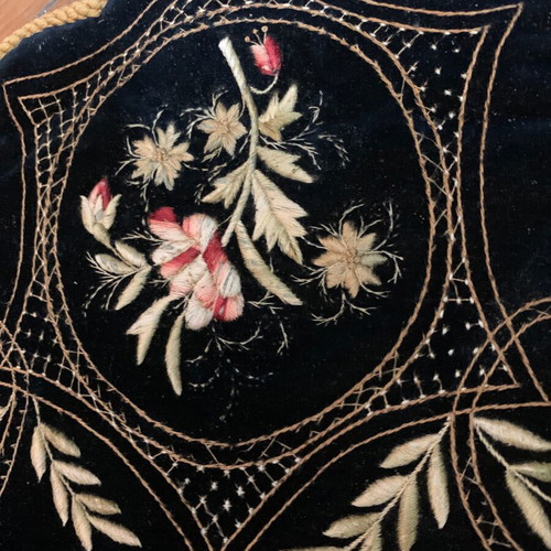 Traditional embroidery used, dark velvet