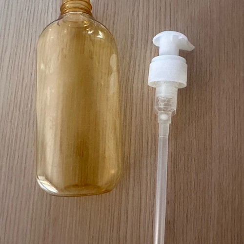 Plastic bottle with dispenser like new