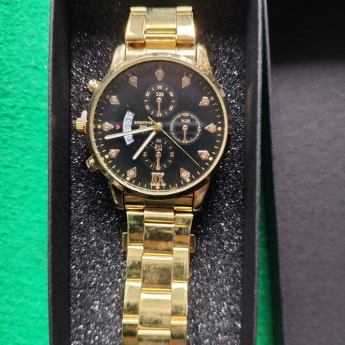 Geneva watch in gold color with black dial like new