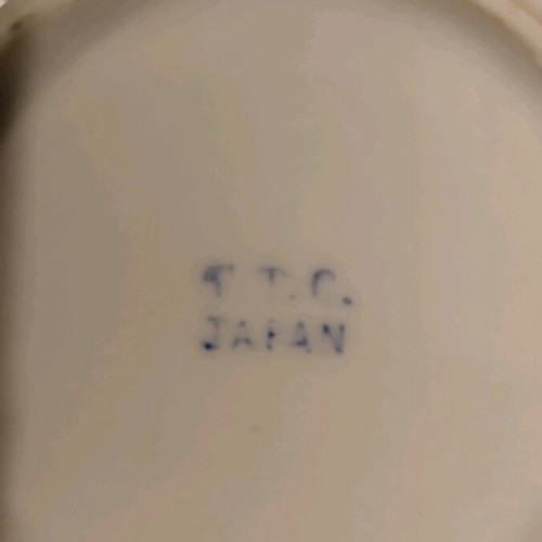 Collectible old coffee cup used from Japan with saucer