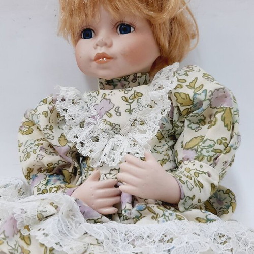 Vinyl doll 33 cm with elastic joints, blonde hair, dress and shoes, like new