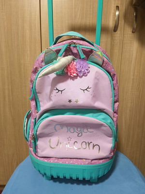 School backpack with wheels used