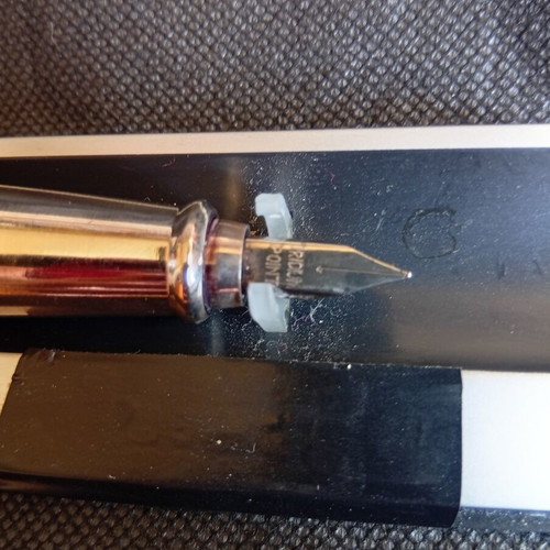 Parafernalia pen used, metal chrome finish, 1980s design