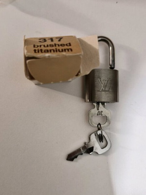 Louis Vuitton padlock brushed titanium