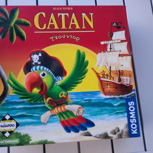 Catan Junior board game like new, missing one yellow pirate lair