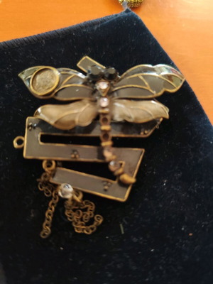 Bronze lapel pin like new, gold butterfly design