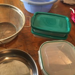 Kitchen items used, tupperware, strainer, basin