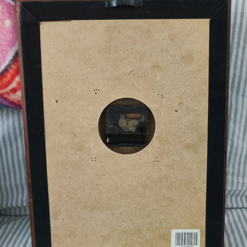 Wall clock used with decorative elements