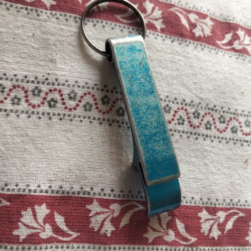Keychain bottle opener used, white and blue