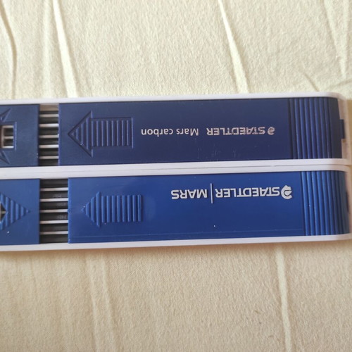 Mechanical pencil leads, 12 and 11 in two cases