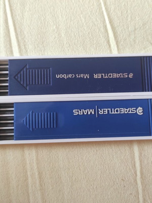 Mechanical pencil leads, 12 and 11 in two cases