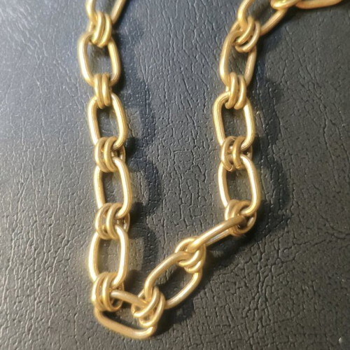 Long steel necklace chain like new, gold tone