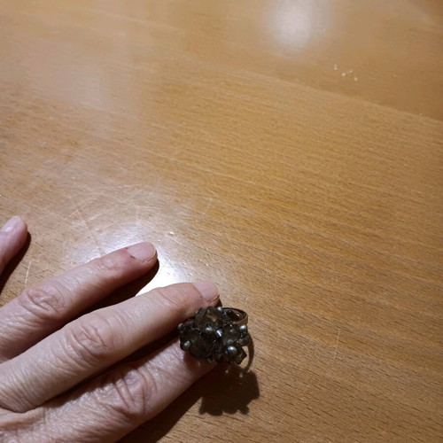 Faux ring with intricate design and adjustable size, new, silver
