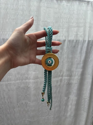 Handmade charm with evil eye used, gold and turquoise details