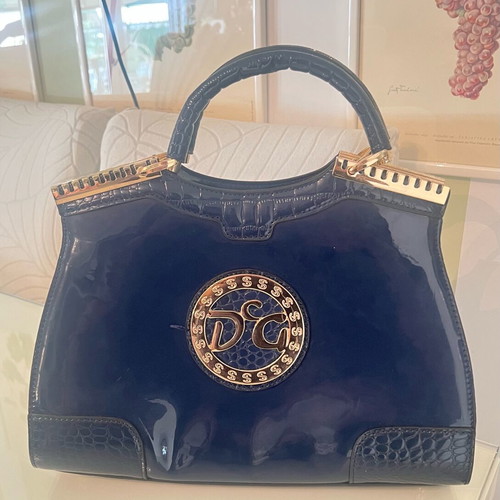 Navy Blue Lustre Handbag like new with gold metal details