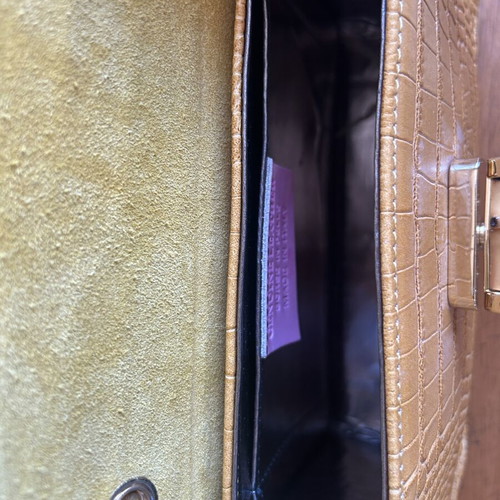Yellow leather bag with bamboo strap