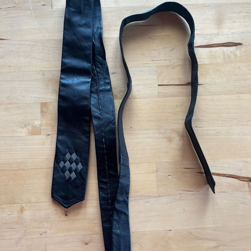 Leather black tie used with gray detail