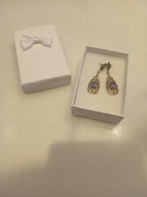 Silver earrings with purple stones