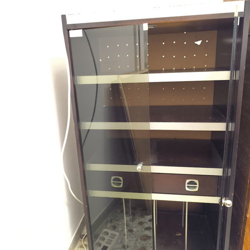 Vintage wooden cabinet with silver details, shelves and glass doors