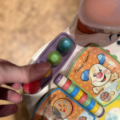 Fisher-Price activity chair used with interactive play table