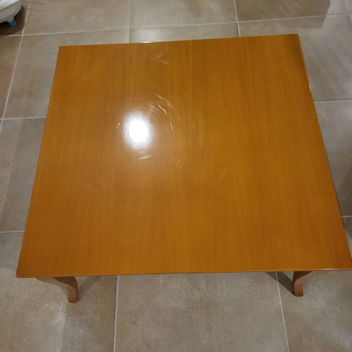 Wooden coffee table used with wear marks