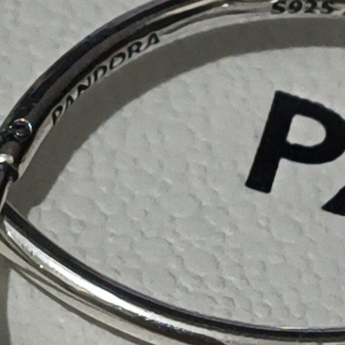 Pandora silver hoop earrings like new with engraved logo