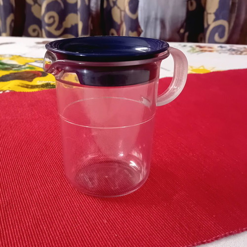Vintage Tupperware jug with lid and handle like new