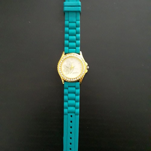 Women's round wristwatch with rhinestones used