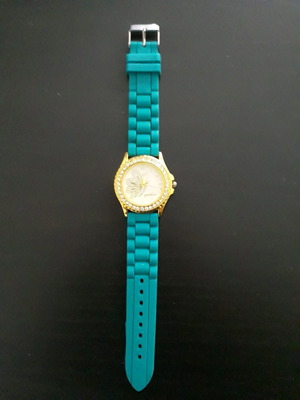 Women's round wristwatch with rhinestones used