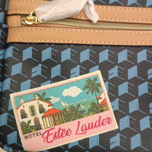 Estée Lauder Mini Backpack new, blue geometric pattern