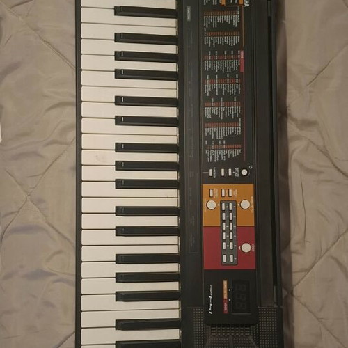 Yamaha PSR F51 keyboard like new with stand