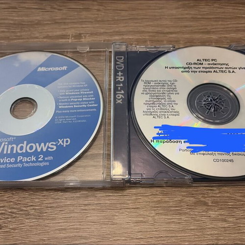 Windows XP Home Edition SP2 recovery and service pack CDs used