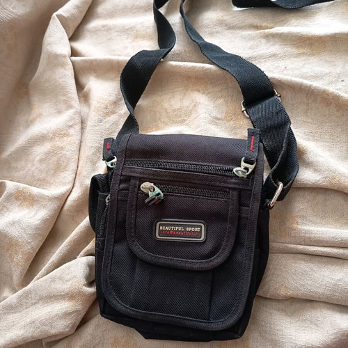 Men's bag like new, black with multiple compartments