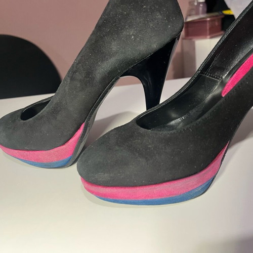 Castor pumps with 3 cm platform and 12 cm heel like new