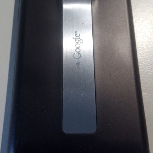 LG Ρ990 functional smartphone with charger and minor screen scratches
