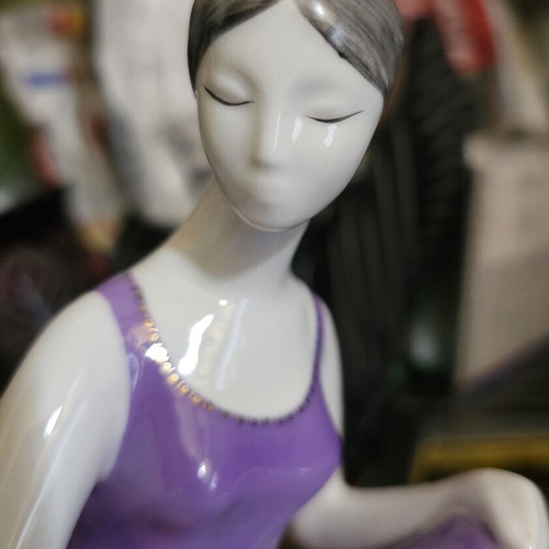 Hollohaza porcelain figurine of girl collecting water used