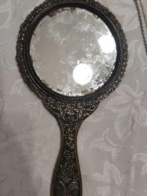 Vintage brass hand mirror used