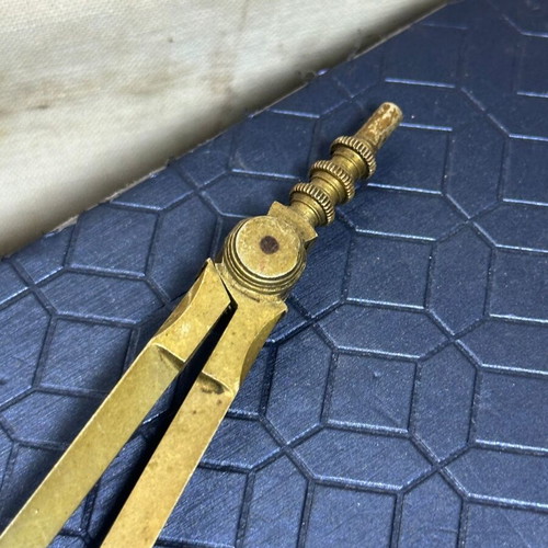 Vintage brass adjustable compass for drawing and cartography used