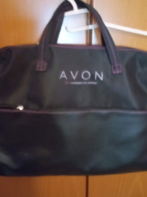 Briefcase with soft material in black color with 2 compartments and Avon pocket like new