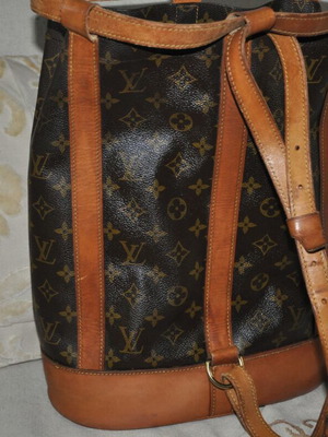 Louis Vuitton Randonee Backpack mm used, honey patina