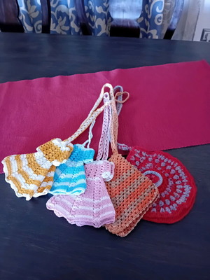 Crocheted potholders pack of five used, vintage colors