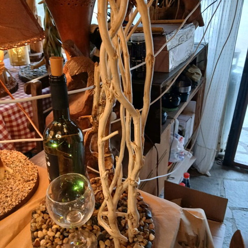 Table lamp with ivy wood, Merlot bottle, and wine glass