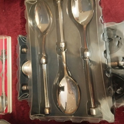 Silver decorative bowls, cup and six spoons used