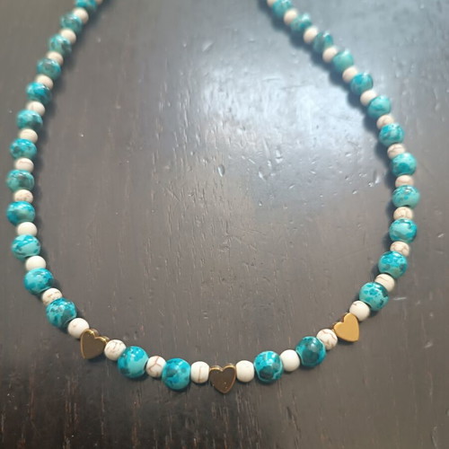 Handmade beaded necklace with gold heart detail