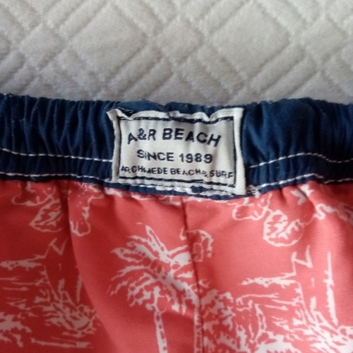 Archimede baby swimsuit unused for 12+ months, coral with blue