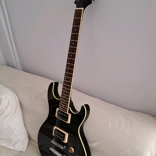 Electric guitar with Laney amplifier like new
