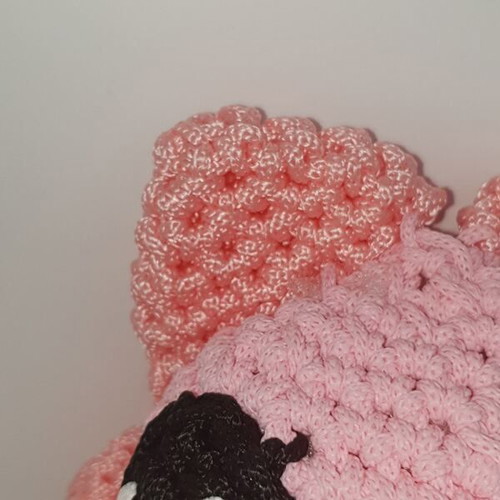 Handmade crocheted doll faces new, piglet