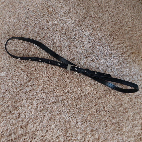 Belt thin black adjustable like new with buckle