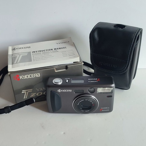 Yashica T Zoom 35mm film camera new with Carl Zeiss lens