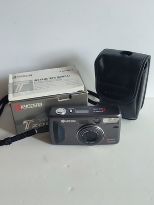 Yashica T Zoom 35mm film camera new with Carl Zeiss lens